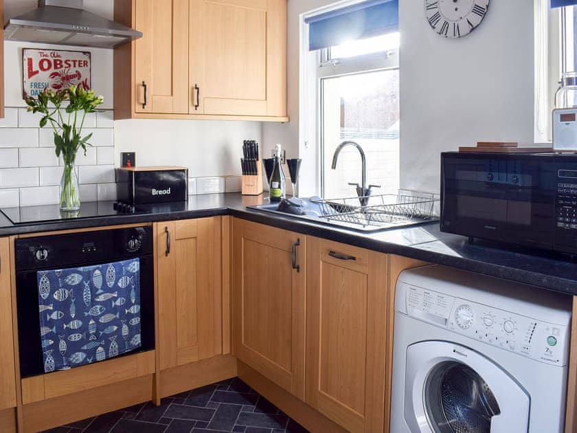 Kitchen with laundry faculities | Mariner’s Cottage, Skinningrove, near Staithes
