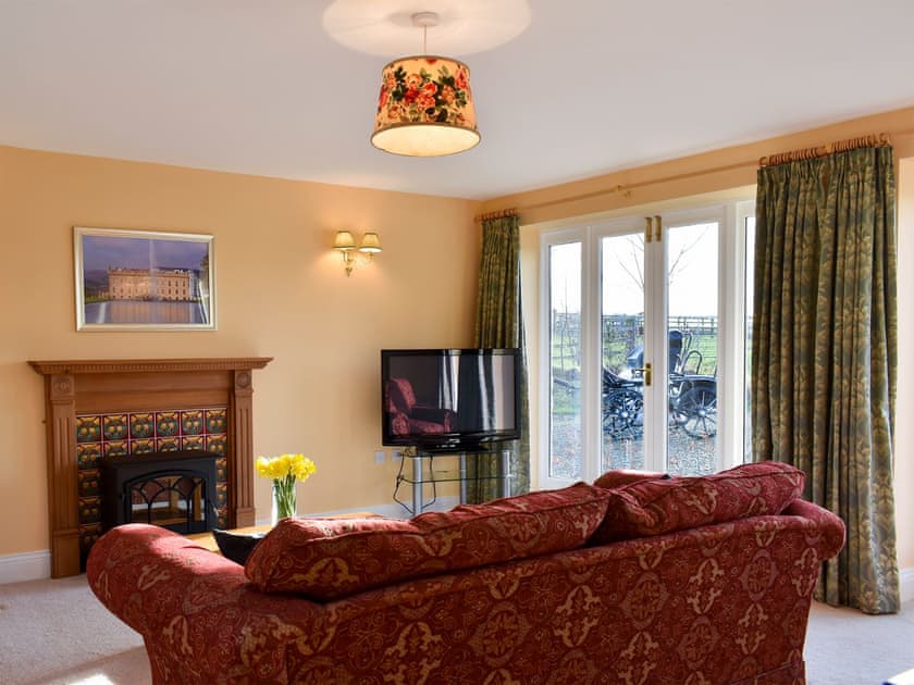 Large and comfortable living room | Grange Cottage, Ovington, near Richmond