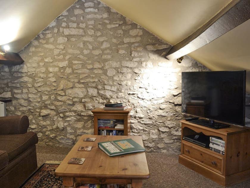 Cosy mezzanine level living area | Old Barn Cottage, Lockton near Pickering