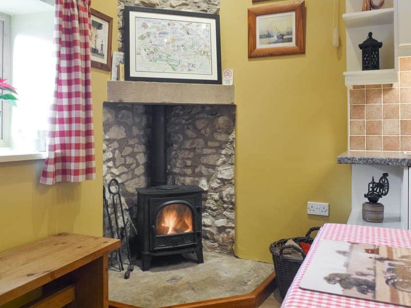 Warming wood burner in kitchen and dining room | Old Barn Cottage, Lockton near Pickering