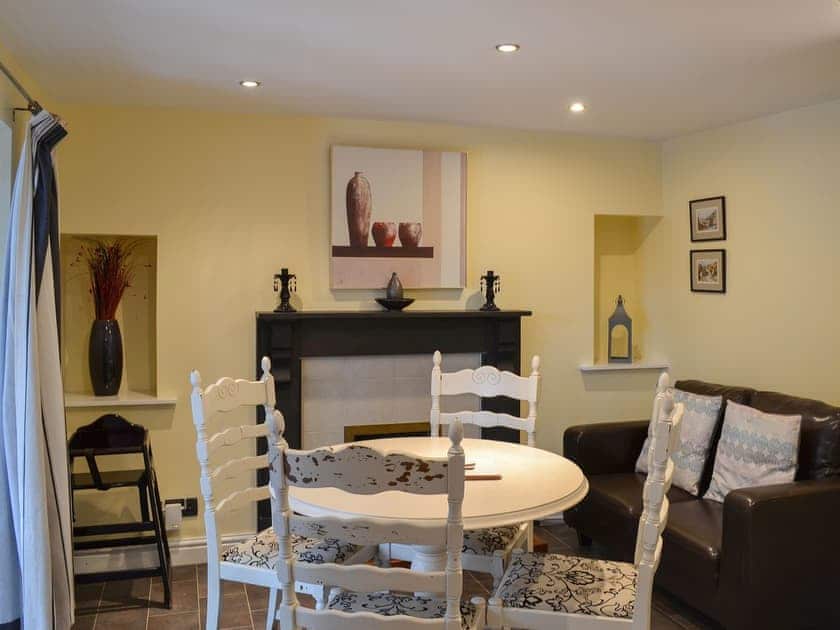 Light and bright dining area with doors to the garden | Brewers Cottage, Cropton, near Pickering