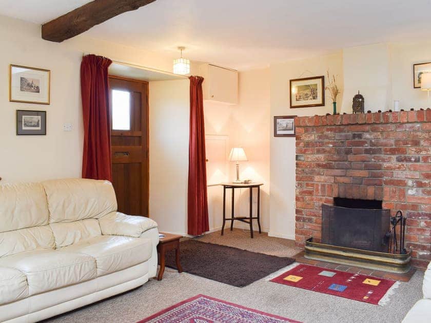 Comfortable beamed living room | The Blacksmith Shop, Shorwell