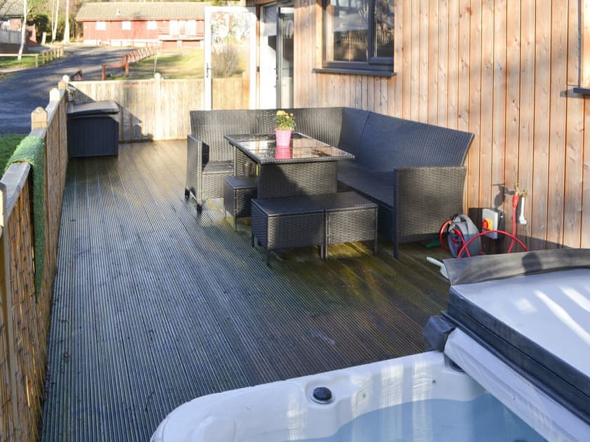 Outdoor area with hot tub  | The Hideaway, Otterburn, near Bellingham