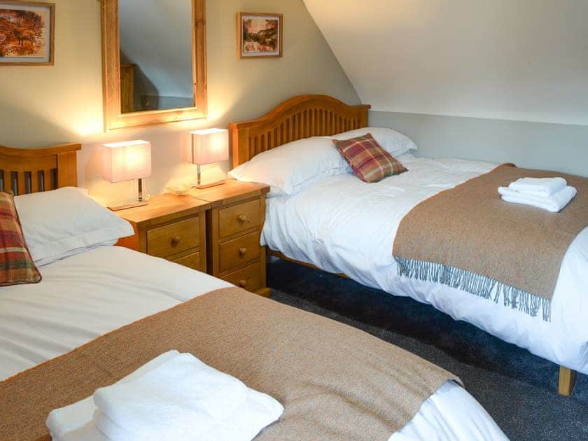 Delightful bedroom with twin double beds | Wallace House, Dornoch, near Tain