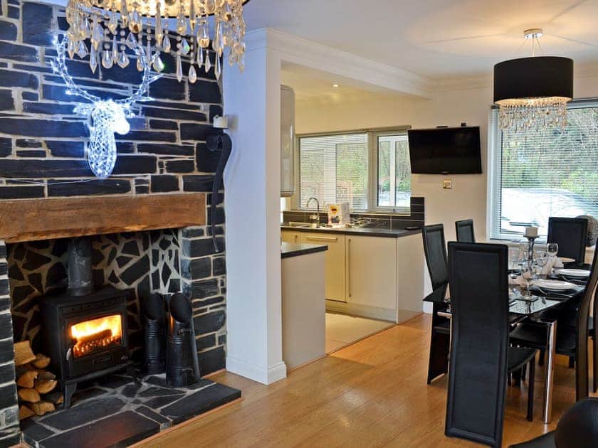 Luxurious dining room with wood burner | Dyffryn, Betws-y-Coed