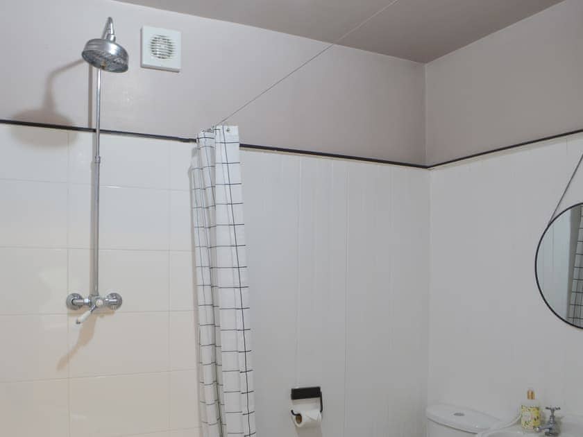Bathroom with shower over the bath | Beachcomber Cottage, Newbiggin-by-the-Sea, near Morpeth
