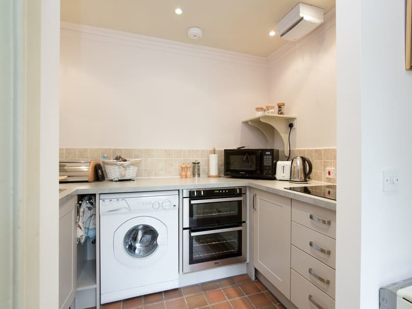 Compact fitted kitchen | Orchard Cottage at Braidwood Castle - Braidwood Castle, Braidwood, near Carluke