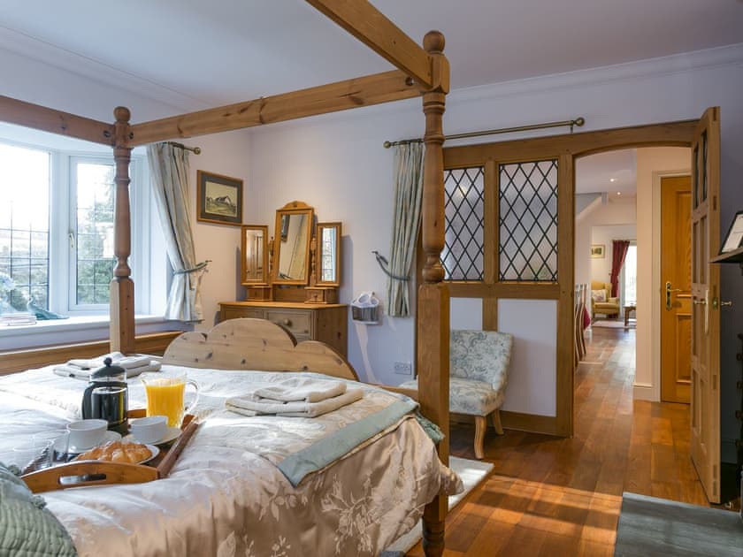 Four poster bedroom | Twisly North Lodge, Catsfield, near Battle