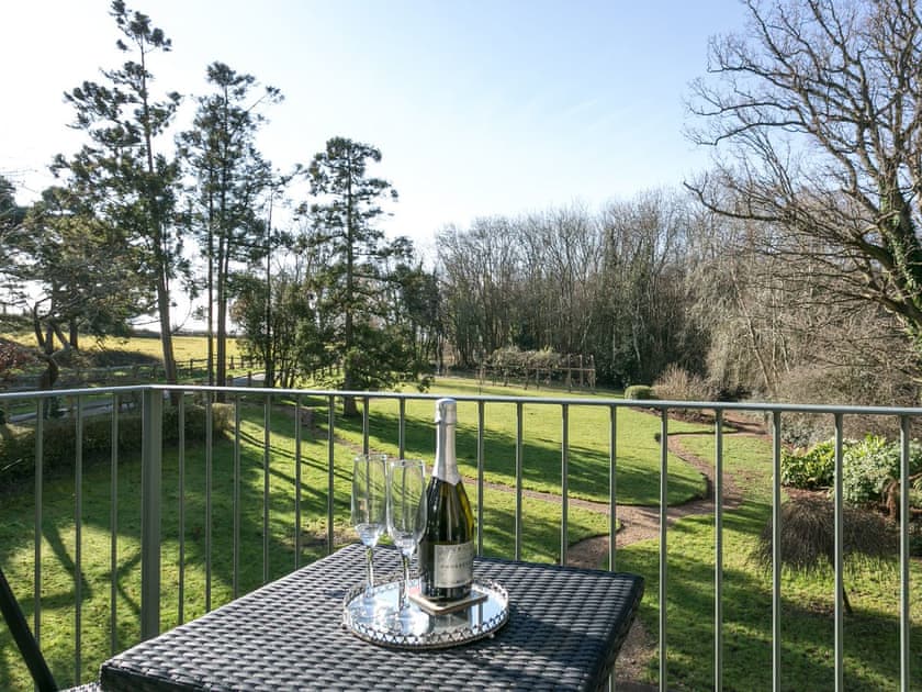 Balcony overlooking the garden | Twisly North Lodge, Catsfield, near Battle
