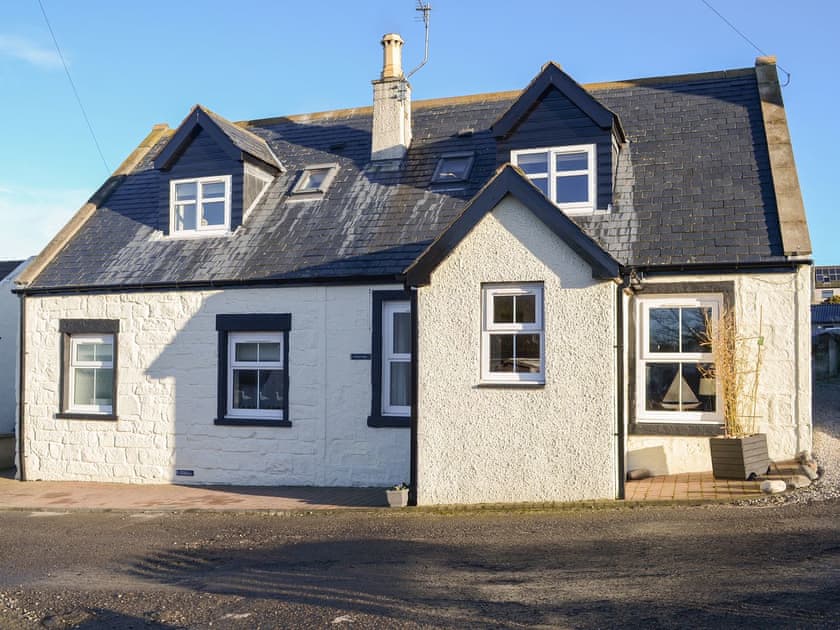 Charming traditional detached stone built holiday home | Rosslyn Cottage, Portmahomack, near Tain