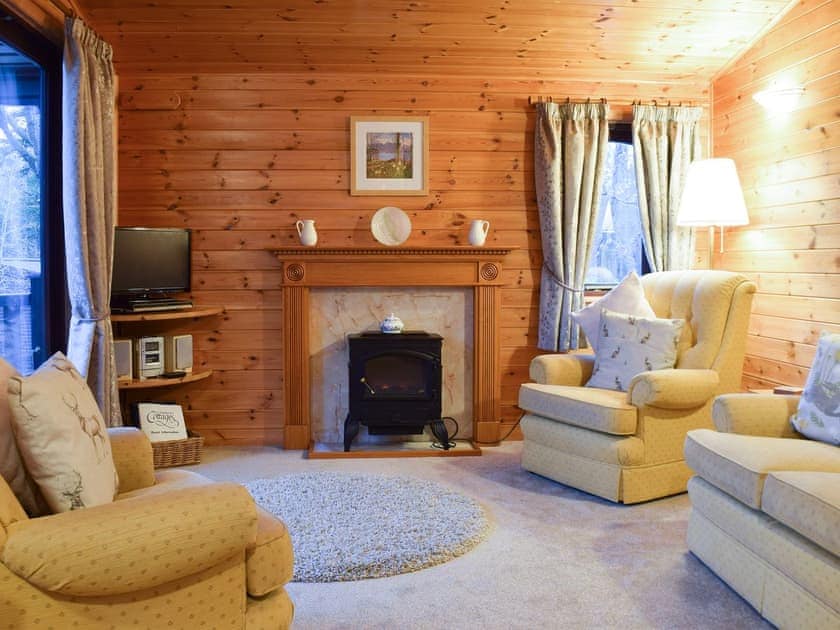 Living room with sliding doors to the outside | Fern Lodge - Burnside Park - Burnside Park, Keswick
