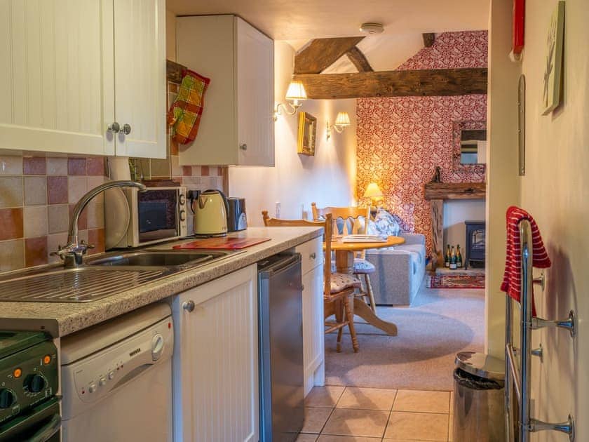 Well-equipped kitchen adjoins the living room | Foxglove Cottage - Laskill Grange, Bilsdale, near Helmsley