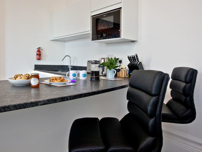 Well equipped kitchen area | The Kensington Suite, Plymouth