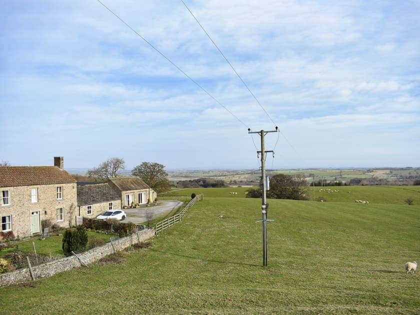 Set on a working farm in an elevated position in the Yorkshire Dales | High Dalton Hall Cottage, Newsham, near Richmond