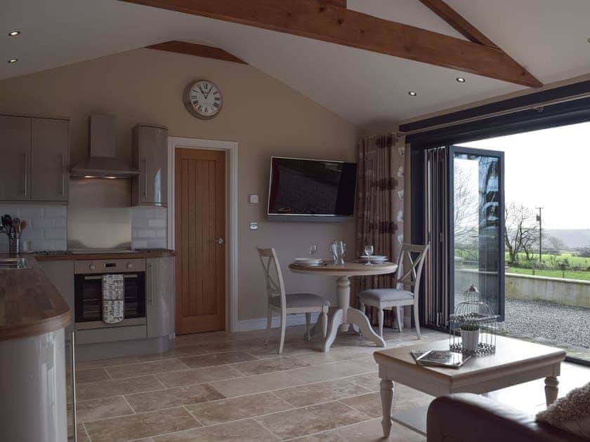 Open plan living space with bi-folding doors | Castle Farm - Castle Farm Cottages, Tufton, near Haverfordwest