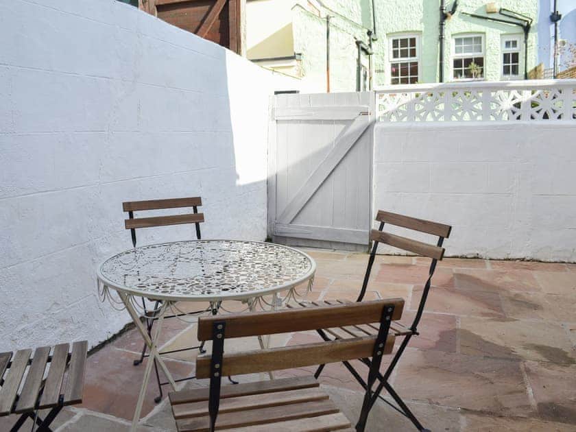 Lovely and private courtyard with table and chairs | Lobster Pot Cottage, Scarborough