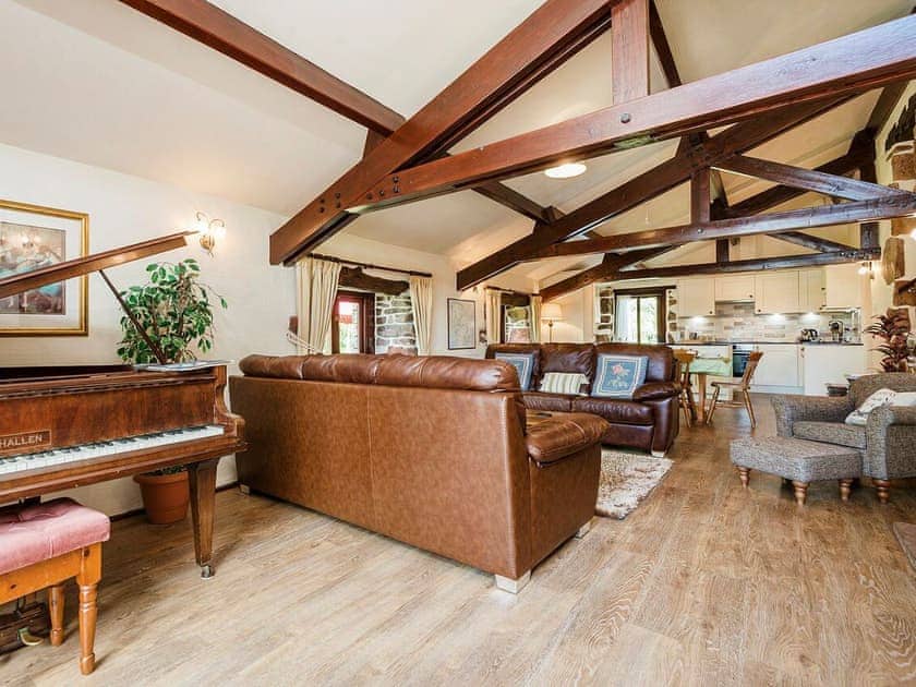 Spacious lounge with ‘baby grand’ piano | Wastwater Cottage - Bridge End Farm Cottages, Boot, near Eskdale