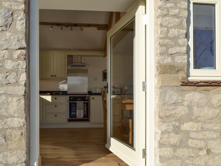 Entrance to kitchen diner from patio | Grange Cottage, Harome, near Helmsley
