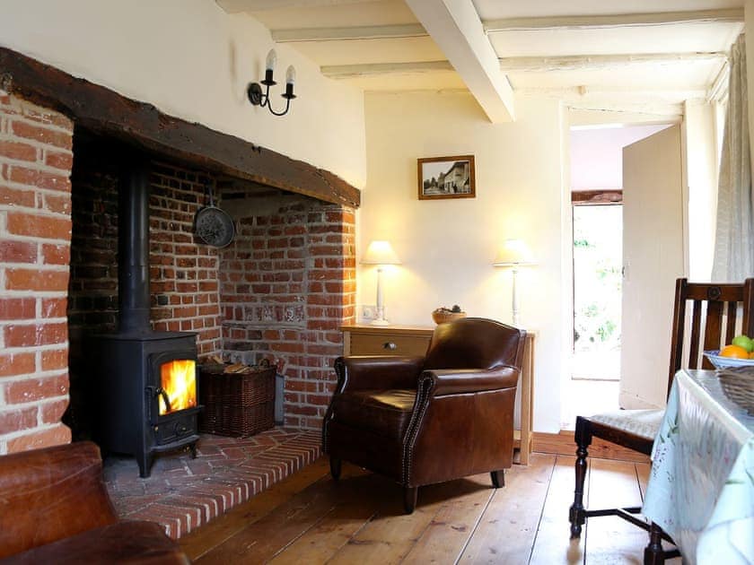 Cosy living room with wood burner | Box Cottage, Eastling