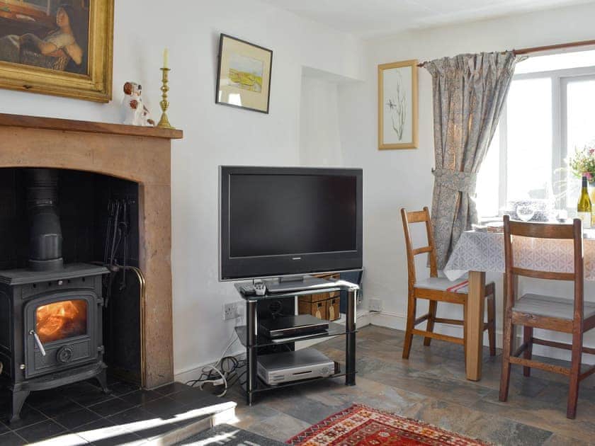 Welcoming living area with wood burner | The Cottage - Bellman Houses, Winster