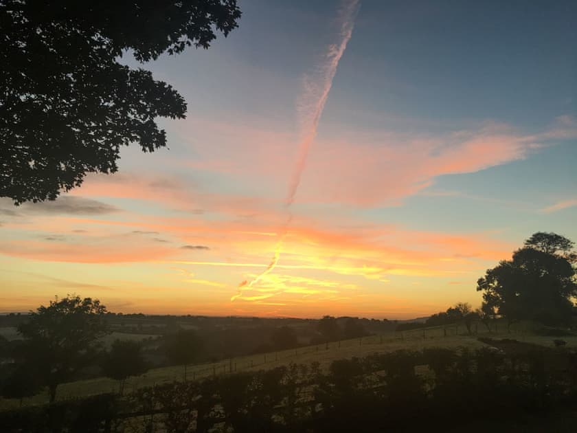 Beautiful sunset over the surrounding landscape | Trezeal Barn, North Hill