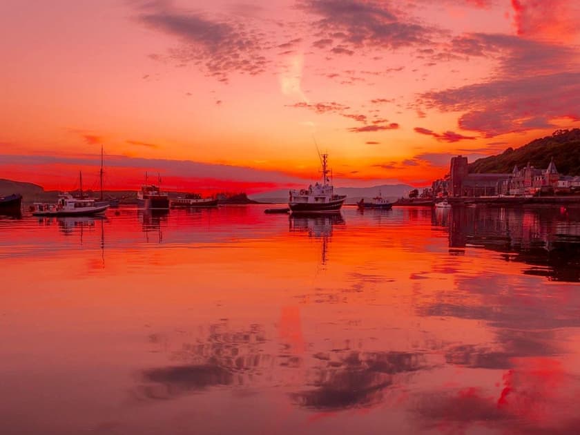 Glorious sunset over the water | Finlaggan Apartment, Oban