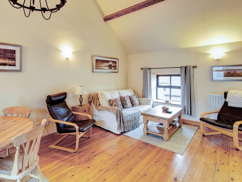 Welcoming living area with high ceiling | Corn Cottage, Fenham-le-Moor, near Belford