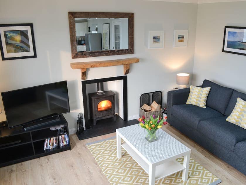 Lounge area with wood burner | Fisherman’s Cottage, Marvig, Isle of Lewis