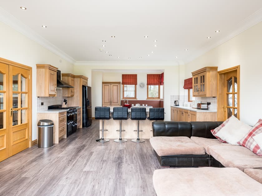 Family seating area with Smart TV in the kitchen and dining room  | Piperdam House, Piperdam, near Dundee
