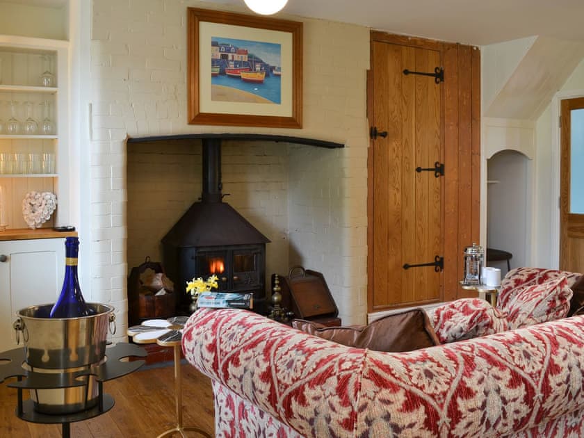 Warm and welcoming living area within the open plan living space | Cranford House - Cranford and The Coach House Cottages, Cranford, near Clovelly