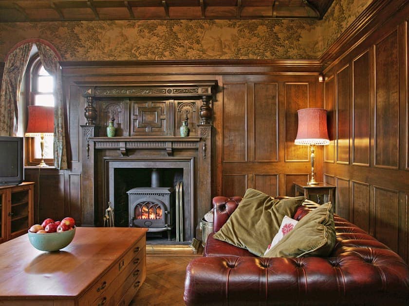 Large living room with wood-burning stove | Dunvarlich House, Aberfeldy