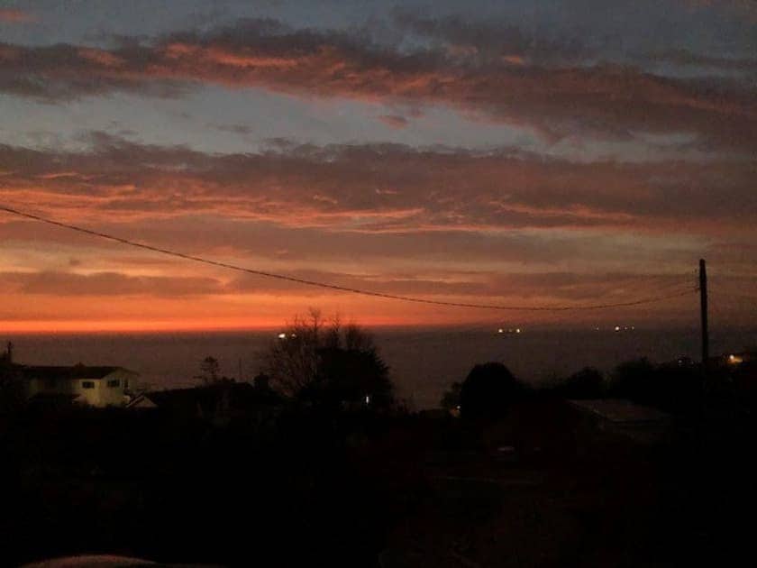 Sunset over Coverack from viewed from the property | Ponsgwedhen, Coverack, near Helston