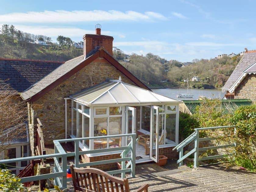Enclosed terraced courtyard with garden furniture | Yorke Villa, Fishguard