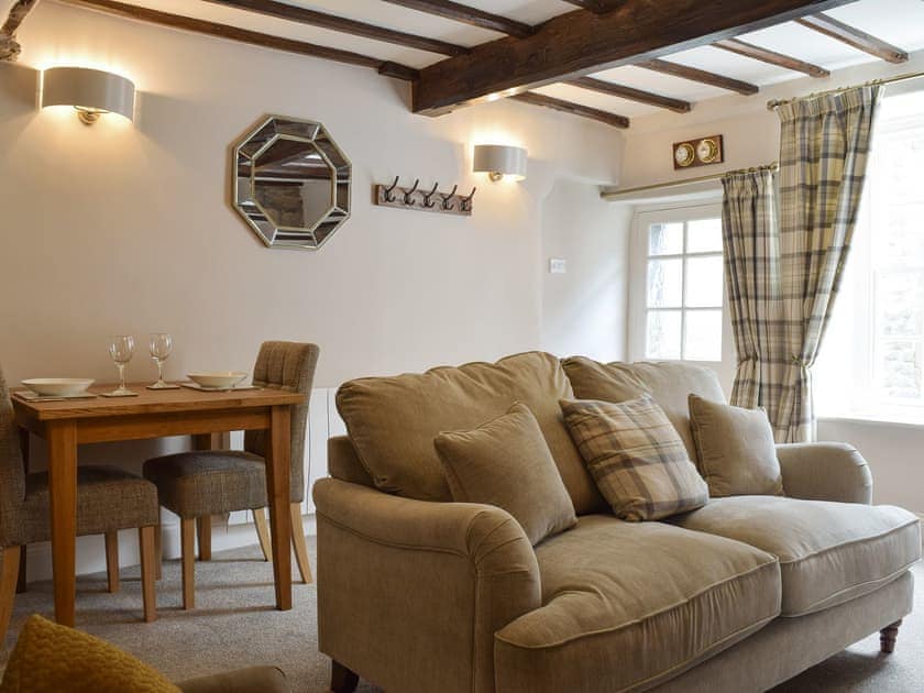 Convenient dining area within living room | Chamber End Fold, Grassington, near Skipton