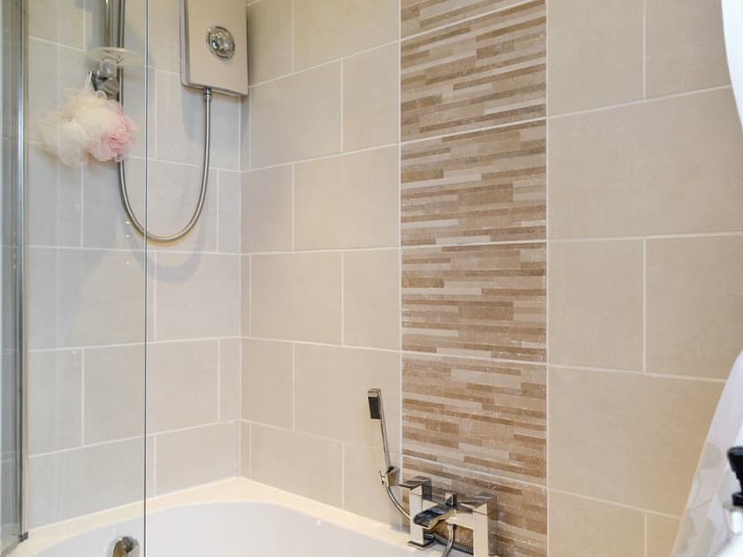 Family bathroom with shower over bath | Pen Parc, Rhosybol, near Amlwch