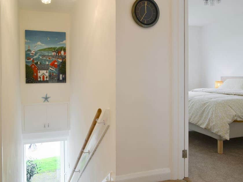 Hallway with stairs to main entrance | Upper Sandstell Point - Sandstell Point Apartments, Spittal, near Berwick-upon-Tweed