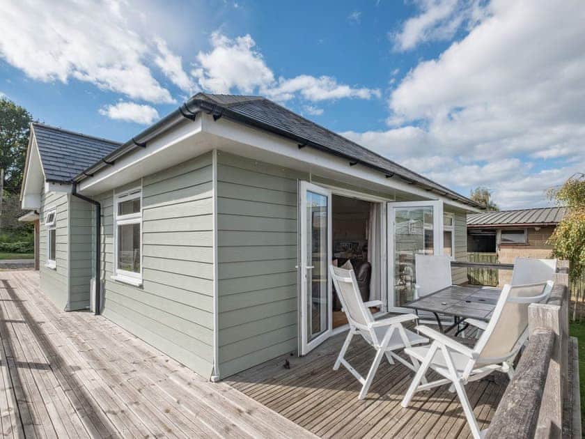 Decked area with outdoor furniture | Grange Farm Holiday’s - Red Squirrel Lodge - Grange Farm Holidays, Wootton, near Ryde