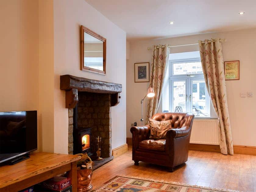 Open plan living space with wood burner | Monkey Cottage, Grassington