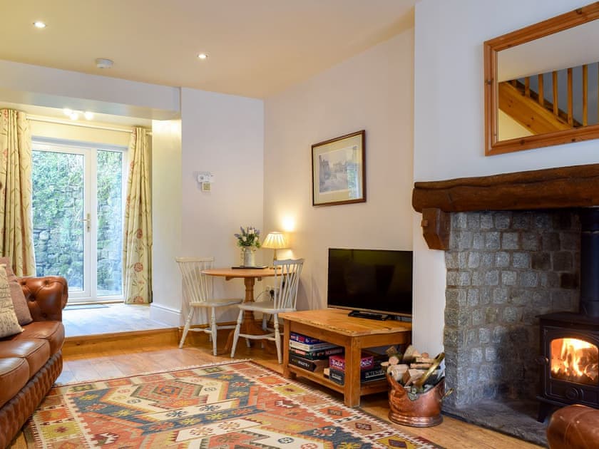 Open plan living space with wood burner | Monkey Cottage, Grassington