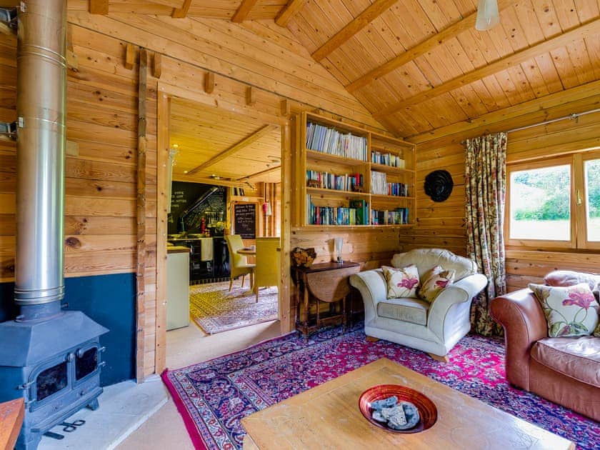 Cosy living room with wood burner  | Ash Mill Cabin, Ashreigney, near Chulmleigh