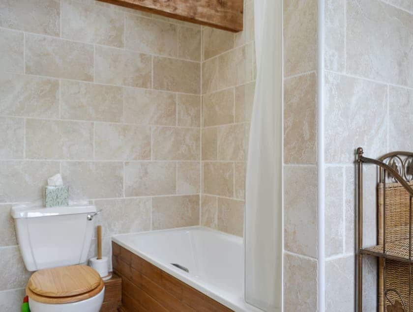 Family bathroom with shower over bath | Cass Lodge, near Easingwold