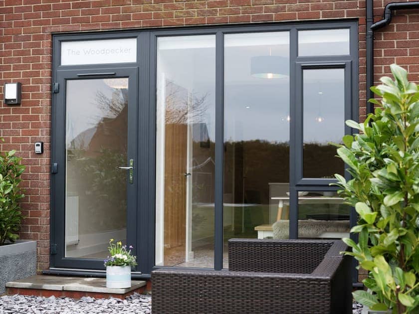 Sitting-out-area | The Woodpecker - High Oak Holidays, Wicklewood, near Wymondham