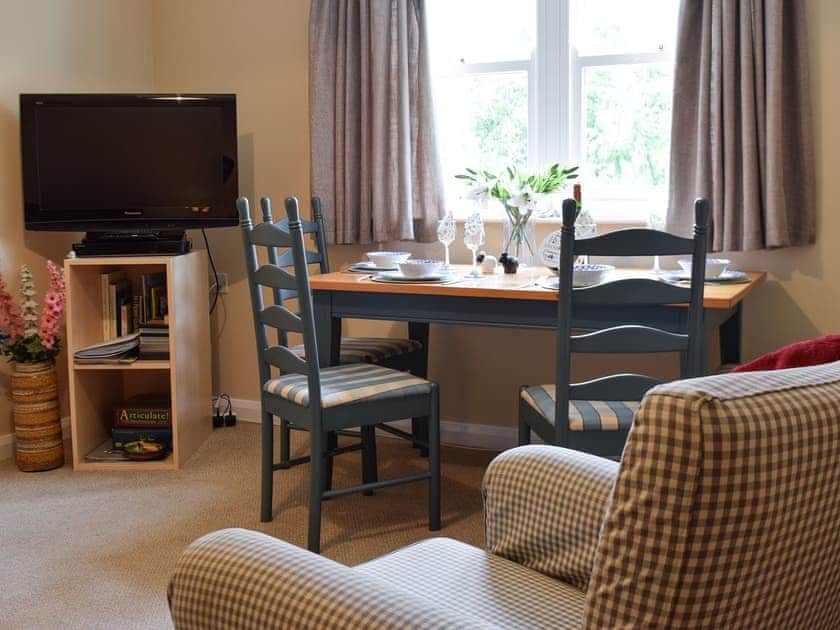 Living room with dining area | 7 Elm Court - Greta Grove Apartments, Keswick
