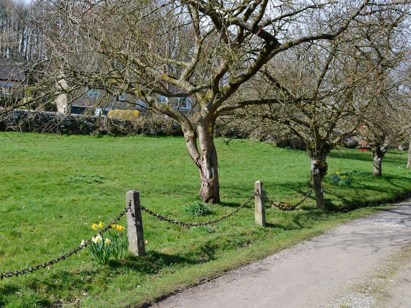 Lawned area across from the property | Lavender Cottage, Bewerley, near Pateley Bridge
