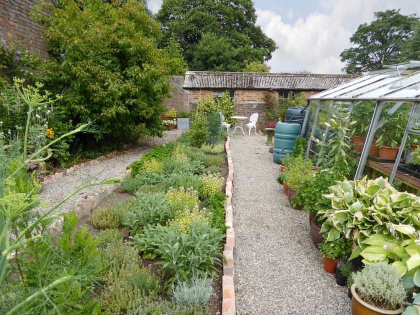 Well-maintained garden areas | Manor House Cottage, Holme on Swale, near Thirsk