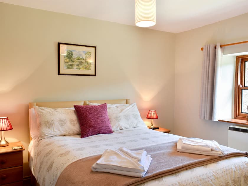 Relaxing bedroom with kingsize bed | 2 Swallowholm Cottages, Arkengarthdale, near Reeth