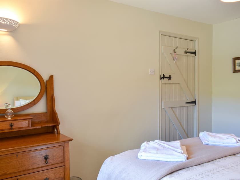 Relaxing bedroom with kingsize bed | 2 Swallowholm Cottages, Arkengarthdale, near Reeth