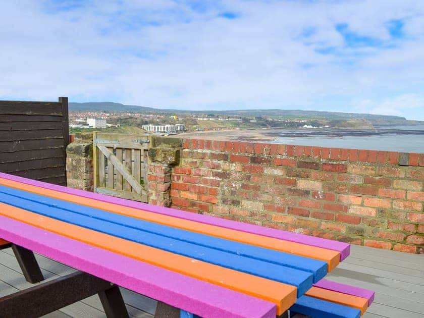 Sitting out area with wonderful coastal views | Twin Bays House, Scarborough