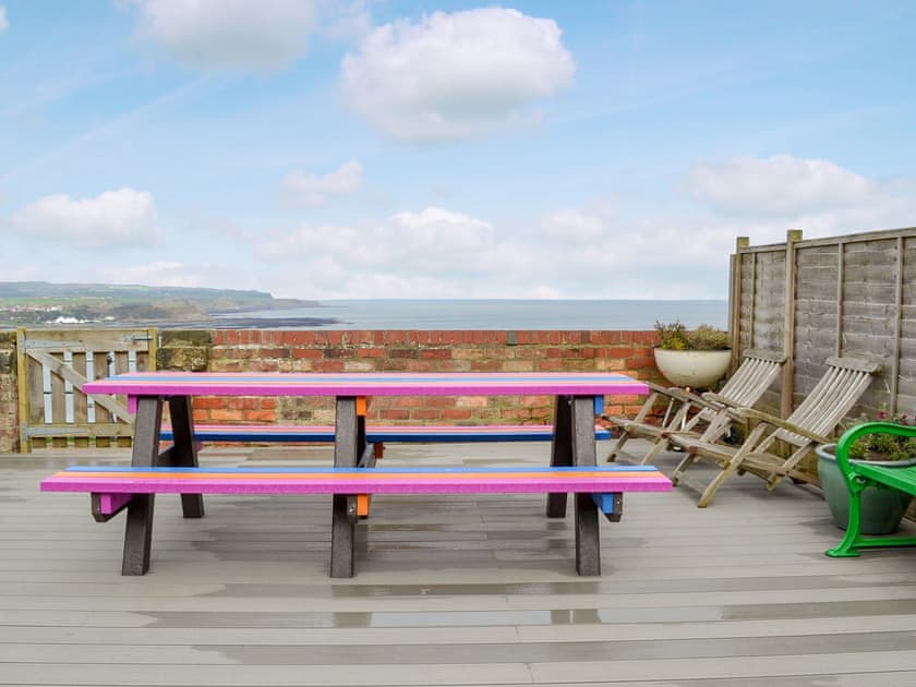 Decked sitting out area with fantastic views | Twin Bays House, Scarborough