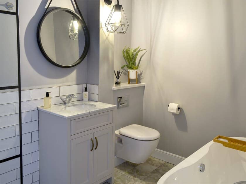 Bathroom with freestanding roll-top bath | Jubilee House, Alnwick